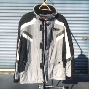 Ski or Snowboarding Uni-Sex Jacket . Women Size: Medium {8-10} . Stryke